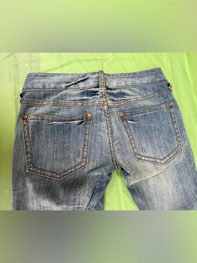 LOW RISE VINTAGE FREE PEOPLE ,BOOT LEG LIGHT WASH JEANS SIZE 24